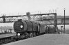 Clapham_Junction_(Windsor_Lines)_Down_milk_empties_geograph-2646794-by-Ben-Brooksbank.jpg