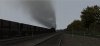 York to Grantham semi-fast headed by 70013 picks up speed on damp track out of York.jpg