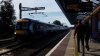 TSW4 - 170 415 leads a 9 coach train past Burnham Station..jpg