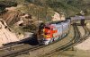 1963-11-16 - Santa Fe F3A with covered wagons and Grand Canyon at Summit, Cajon Pass, California.jpg