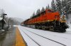 Tail_end_of_eastbound_BNSF_grain_train_at_Essex_station,_January_2013.jpg