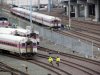 Cab_cars_and_workers_at_MBTA_CRMF,_January_2013.JPG
