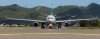 an-airbus-a330-243-taxiing-along-the-runway-view-from-the-front-of-KJMMXD.jpg