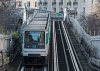 Paris_Metro_Line_6_train_northeast_of_Pasteur_station_140207_5.jpg