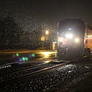 Amtrak_Wolverine_at_Royal_Oak_during_night_rain%2C_October_2014